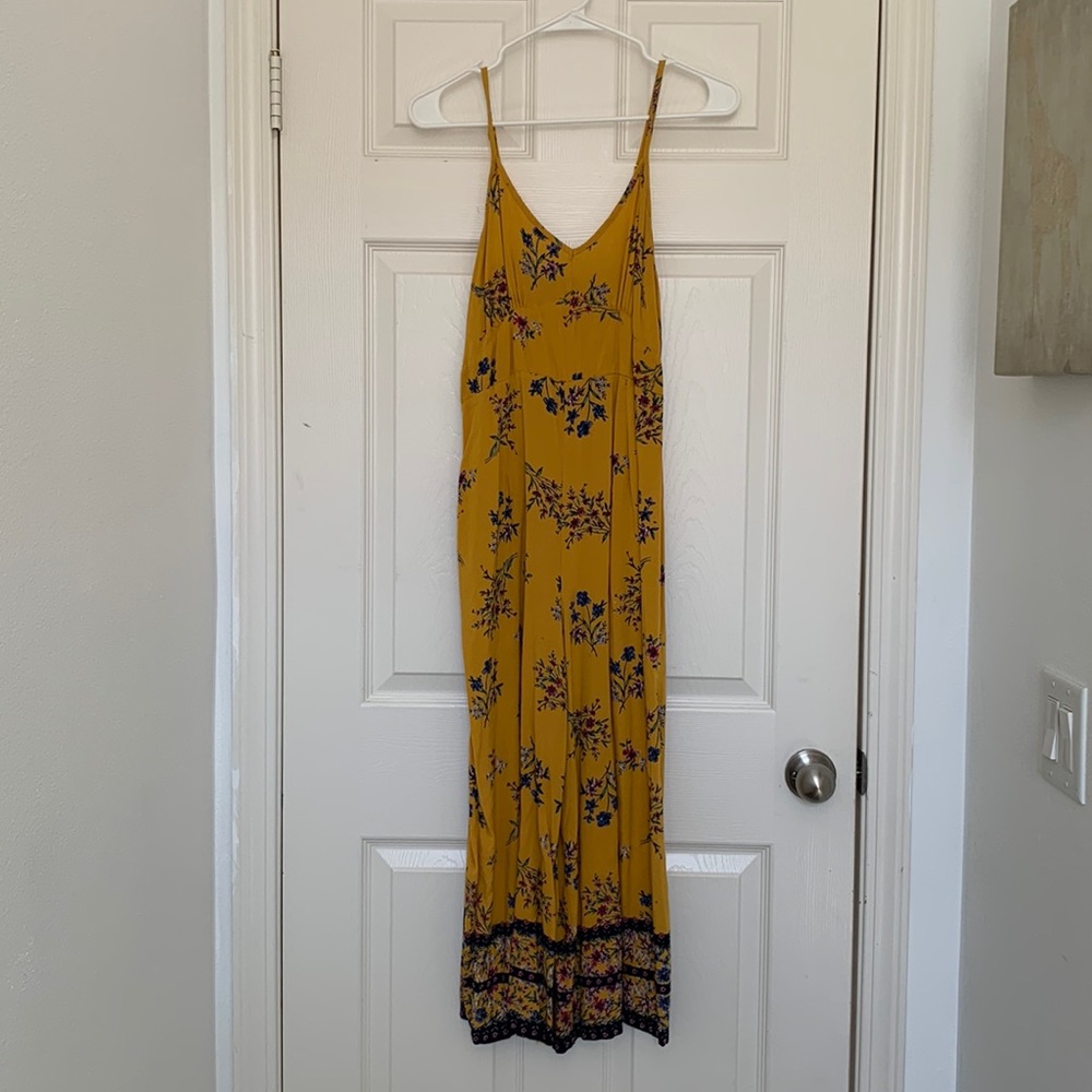 The perfect spring Romper! From Francesca’s, size medium, yellow/multicolor